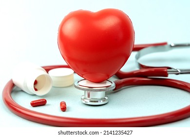 Red heart with stethoscope on white background - Powered by Shutterstock