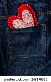 Red Heart For Valentine's Day On Jeans Background. Greeting Card