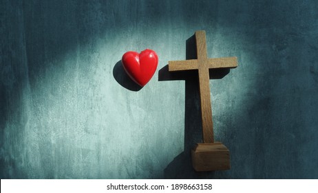Red Heart With Wood Crucifix On Grey Marble. Concept Jesus Loves You, Jesus Crucify Himself On Cross With Love. Forgiving Sin , God's Love, Easter Time , Faith God. Christianity Background.