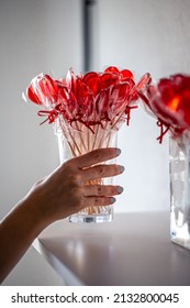 Red Heart-shaped Lollipops On The Counter Of A Candy Store.