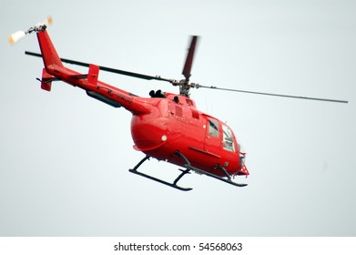 Red Helicopter Is Airborne