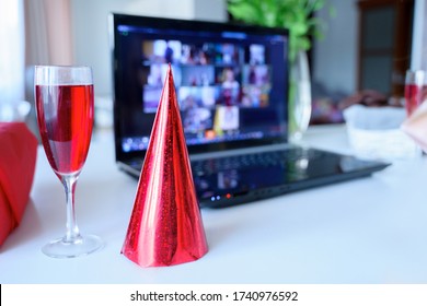 Red Holiday Hat,glass Of Juice.Kids Virtual Birthday Party.Celebration Of Holiday At Home On Isolation.Online Conference,video Call In Laptop,computer.Animator,cookies.Quarantine,coronavirus Covid-19.