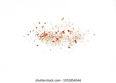 Red Hot Cayenne pepper isolated. Pile crushed red cayenne pepper, dried chili flakes and seeds isolated on white background - Shutterstock ID 1931854544