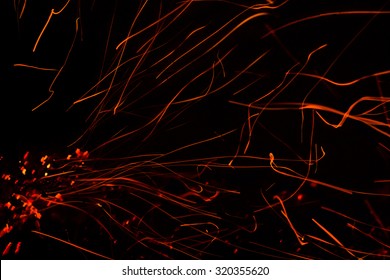 Red Hot Lines Sparks On A Black Background