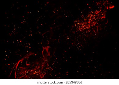Red  Hot Sparks On A Black Background