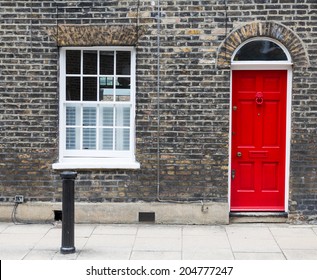 Red House Door On A London Street