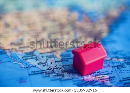 Red house model at Mexico (world map). Real estate / citizenship/ immigration to Mexico concept.