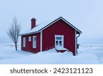 Red house in the snow on the island of Hailuoto, Finland