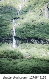 Red House And Waterfalls In Famous Flam (Flåm) Valley, Norway