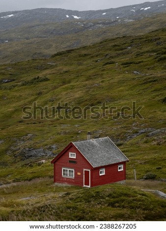 Red hut in Norwegian mountains
