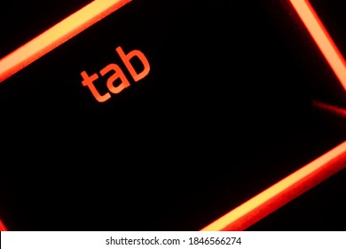 Red Illuminated Keyboard Tab Key Closeup