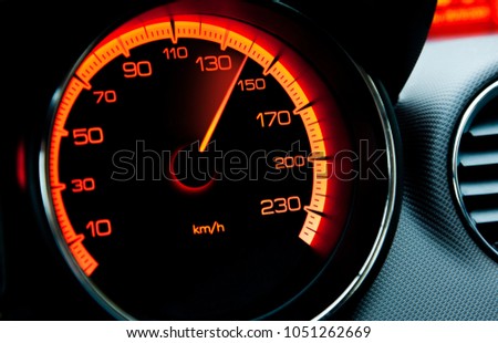 red iluminated speedometer