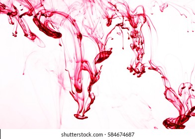 Red Ink In Water.