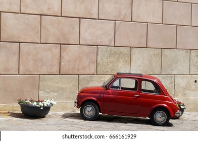 Red Italian Vintage Car Parked