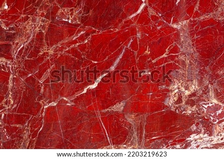 Red Jasper. Gemstone background. Matt natural semi precious mineral pattern. Semiprecious stone texture for ceramic wall and floor digital tiles. Material for interior, exterior design decoration.