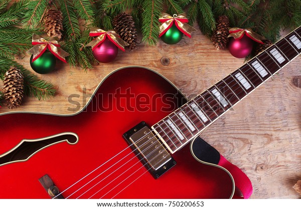 Red Jazz Guitar Christmas Decorations On Royalty Free Stock Image