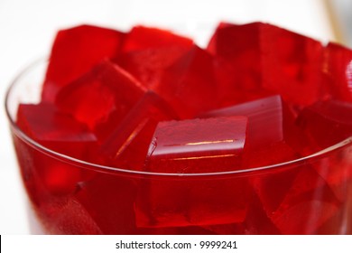 Red Jello Squares In A Glass Bowl