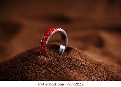 Red Jewellery Ring On Brown Background