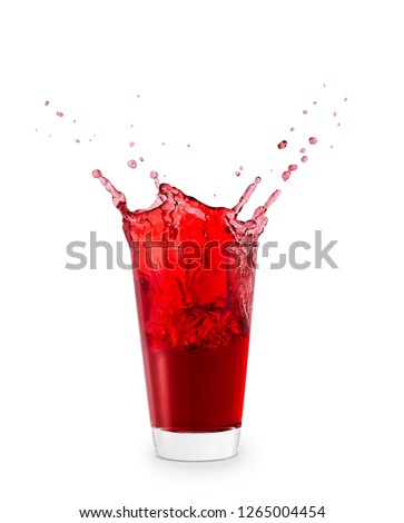 red juice or berry compote with splashes in glass isolated on white background
