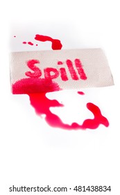 Red Juice Spill With Word And Paper Towel On White Surface