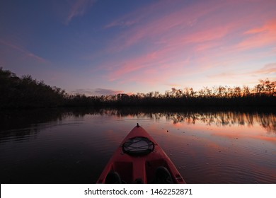 Red Kayak On Coot Bay Pond In Everglades National Park, Florida At Sunset On A Calm Winter Evening.