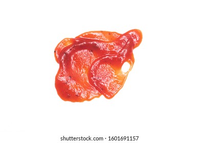 A Red Ketchup Smear Isolated On The White Background.