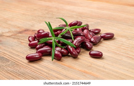 Red Kidney Beans On Wood Background. Cooked Bean Pile, Baked Legume, Canned Red Beans, Rajma, Phaseolus Vulgaris, Leguminous Salad Ingredient