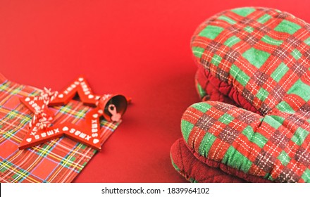 Red Kitchen Checkered Christmas Gloves. Christmas Oven Protective Mitt. New Year And Christmas Concept.