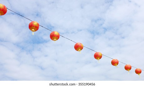 Red lanterns in the cloud sky