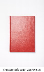 A Red Leather Book(diary, Note) Isolated White, Top View.