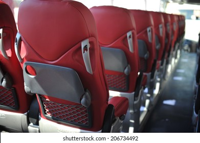 red leather seats in a tourist bus