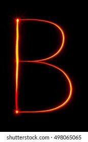 Red Light Painting Letter B On Black Background