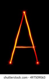 Red Light Painting Letter A On Black Background