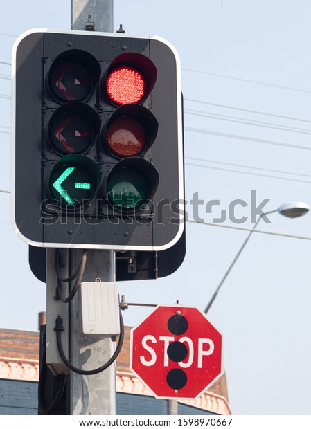 red light sign, Road\
sign -Red sign for cars with stop sign at headlight and turn right\
signpost.