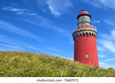 Red Lighthouse In Beach-grass, Bovbjerg Light House. The Danish West Coast. Denmark