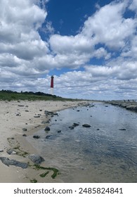 Red Lighthouse by the Beach