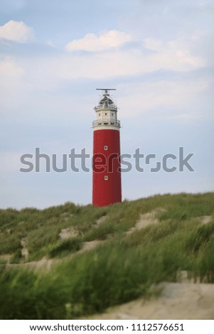 Similar – Foto Bild Leuchtturm auf der Düne