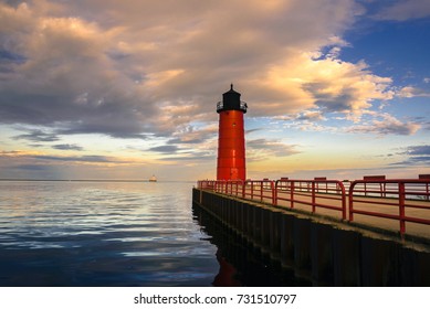 Red Lighthouse At Sunset On Lake Michigan In Milwaukee, WI