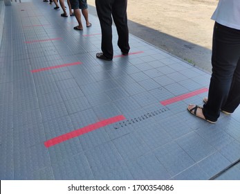 A Red Line Indicator For Social Distancing While Queuing.