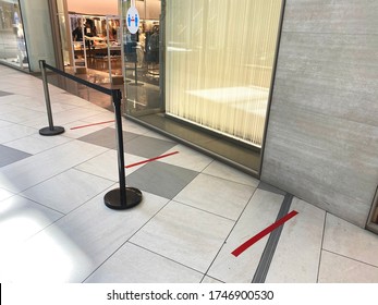 Red Lines For People Queuing Near A Store In A Shopping Center. Concept Of Keep Distance, Social Distancing, Quarantine Or Isolation