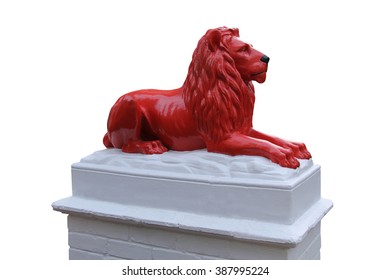 A Red Lion Statue Standing On A White Plinth.