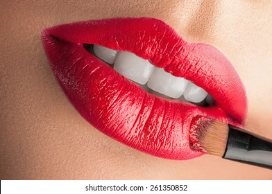 Red lips . To advertise cosmetics.