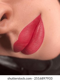red lips with permanent makeup, Close-up of Woman's Lips with Bright Fashion Red Lips. Macro burgundy Lipstick Make-up,  micropigmentation