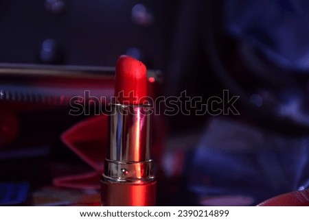 A red lipstick with a dramatic foreground