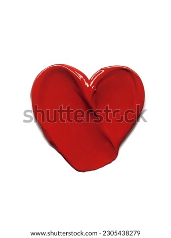 Red lipstick glossy texture in heart shape, texture stroke isolated on white background. Cosmetic product swatch
