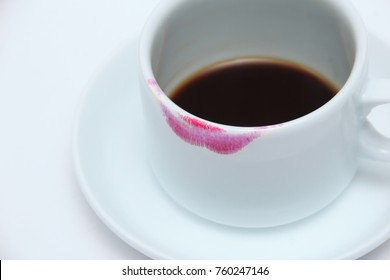 Red Lipstick Mark On A Tea Coffee Cup