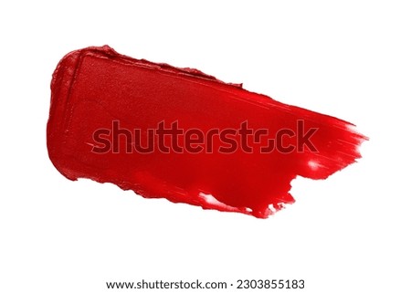 Red lipstick swatch isolated on white background. Brush stroke of lipstick or wet eye shadow for design.
