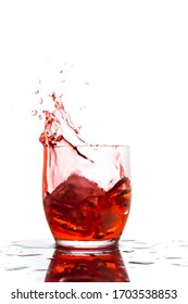 Red Liquid Spash With White Background