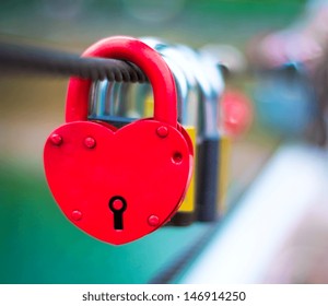 Red Lock In Hart Shape On Rope Bridge