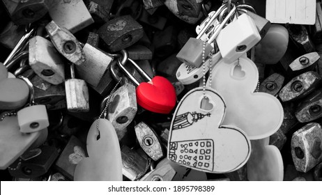 Red Lock in heart shape, Concept conveys deep true love or one love, which is as tenacious as the padlock. (For Valentine's Day content or abstract background), (Padlock without brand)